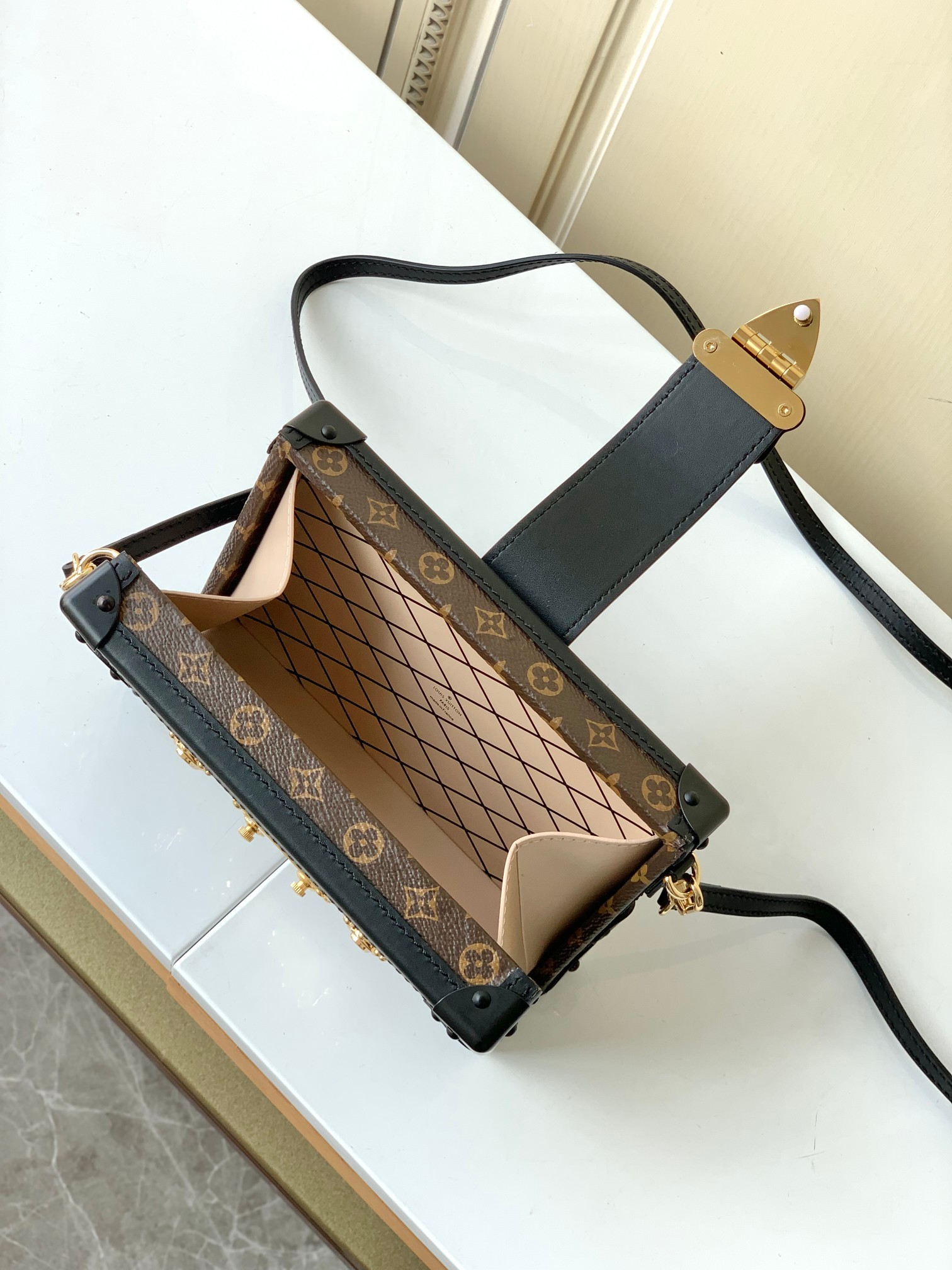 LV PETITE MALLE EAST WEST