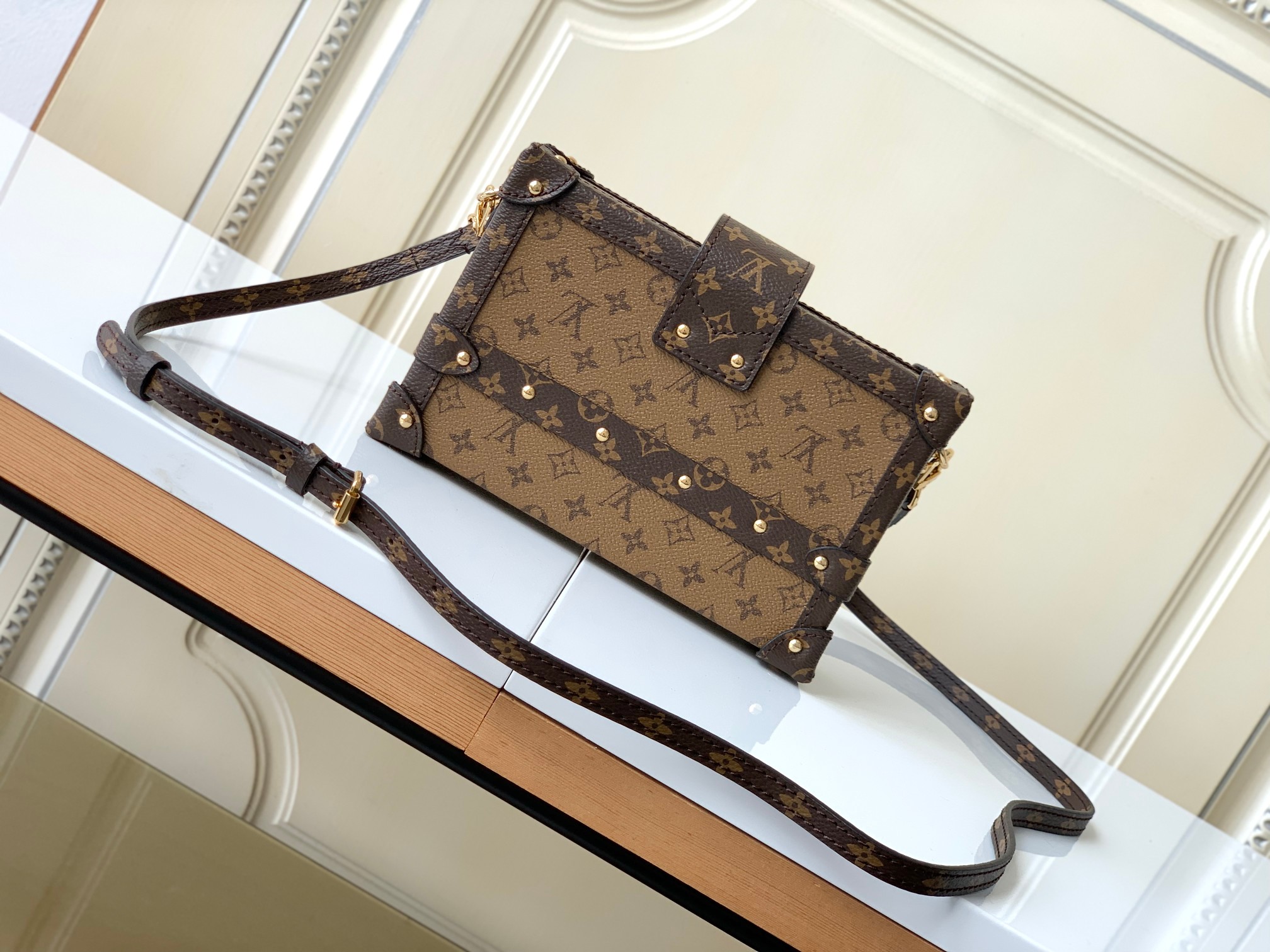 LV PETITE MALLE EAST WEST