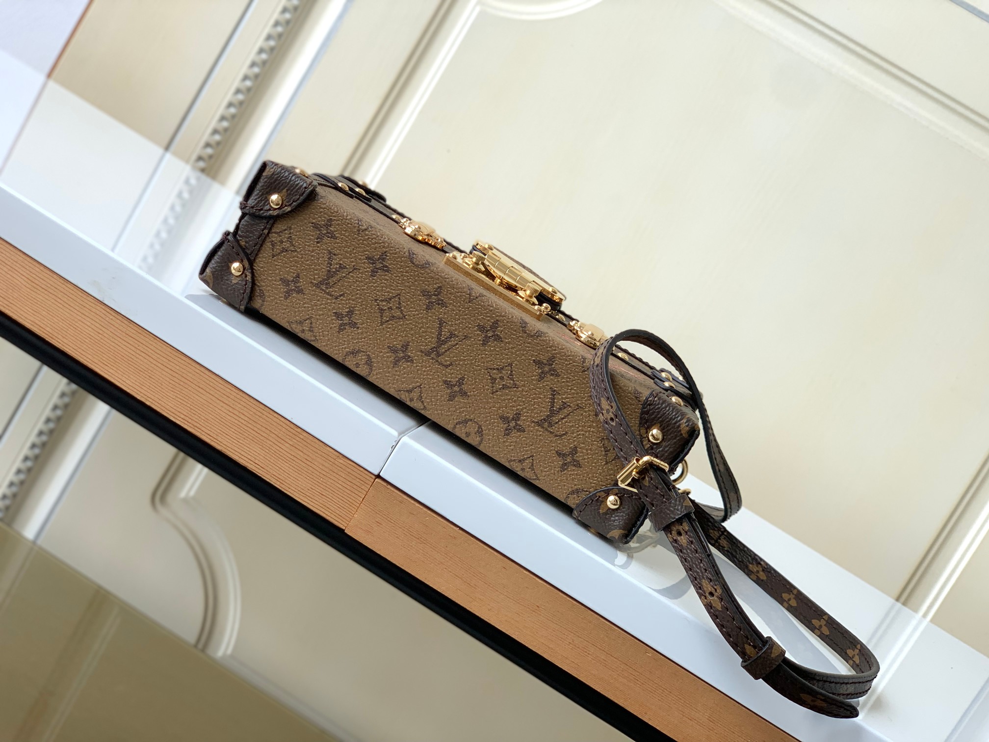 LV PETITE MALLE EAST WEST